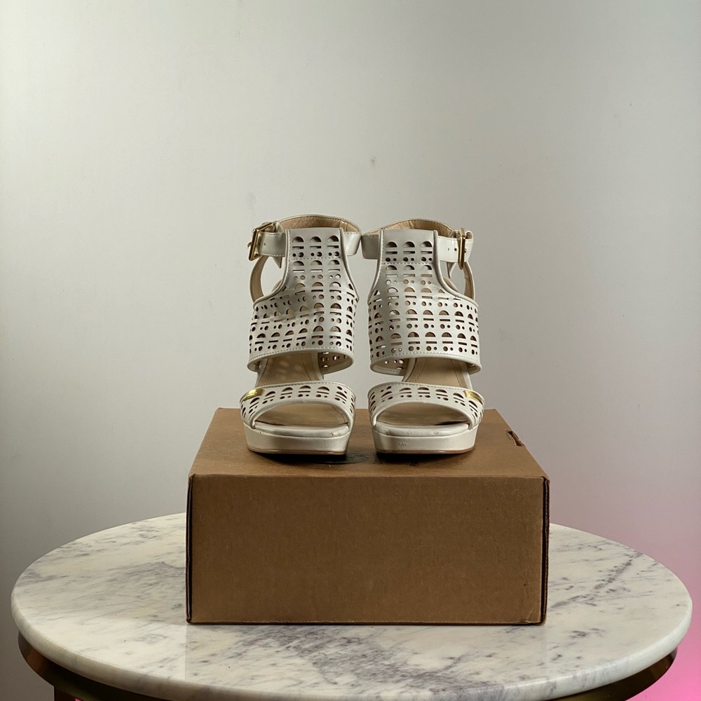 Calvin Klein thick heel sandal.
